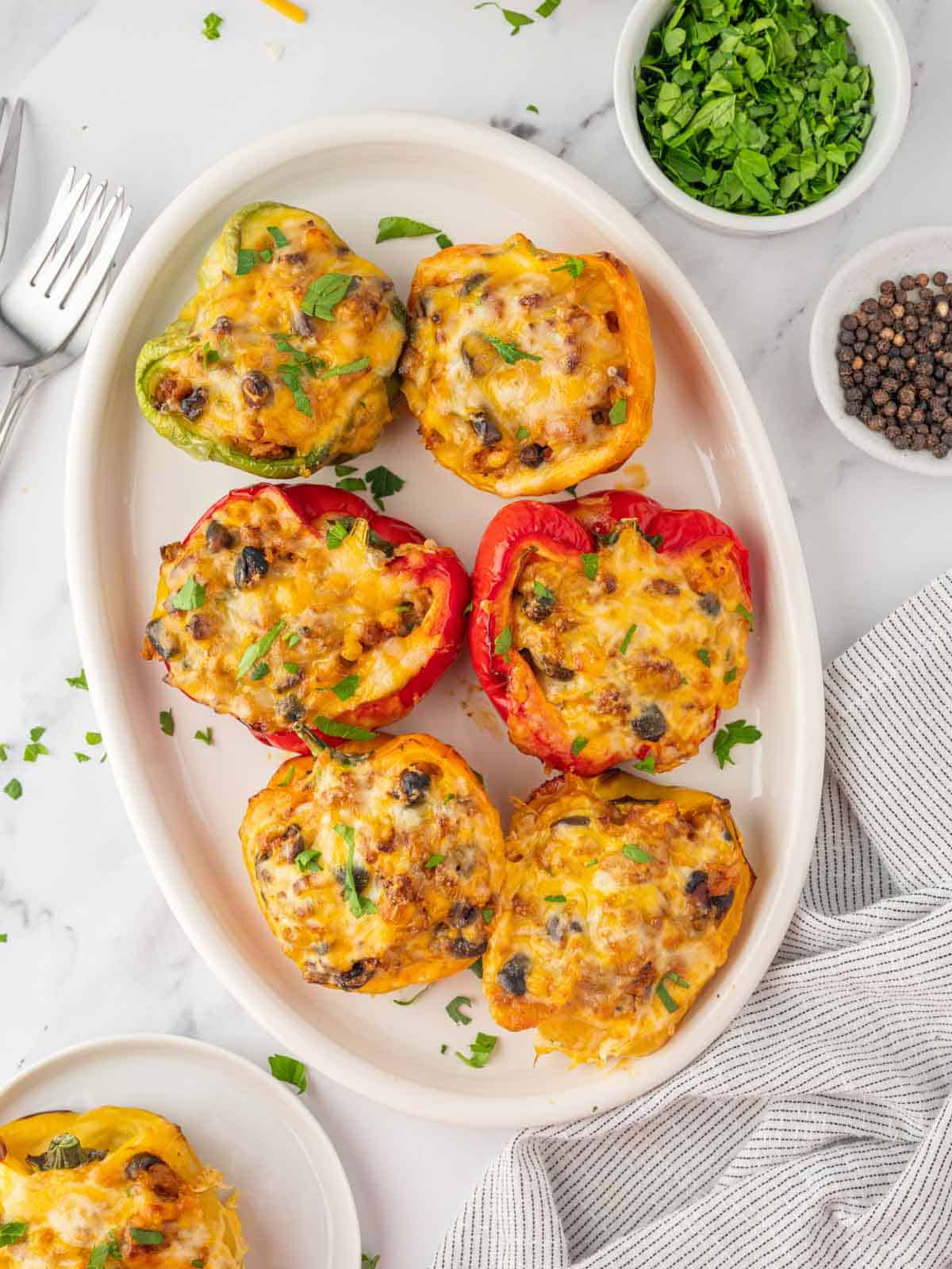 Taco stuffed peppers on a platter.