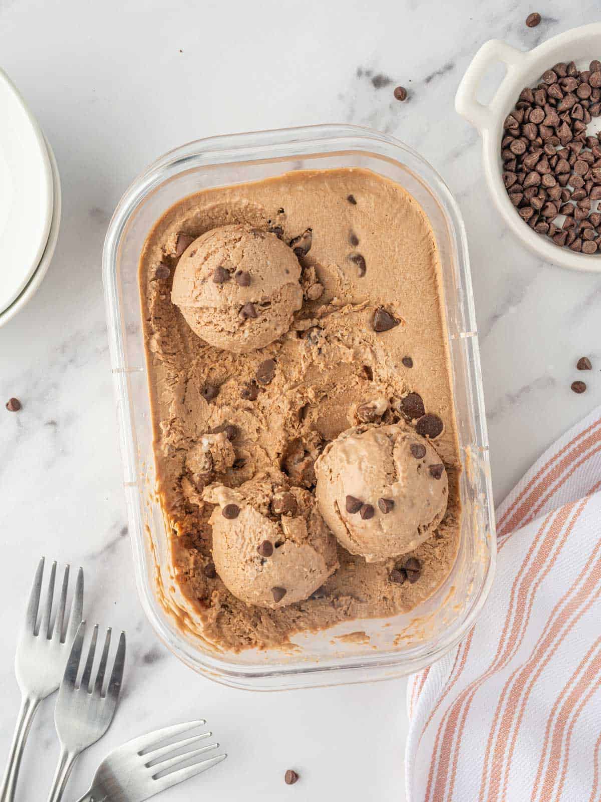 Container of chocolate ice cream.