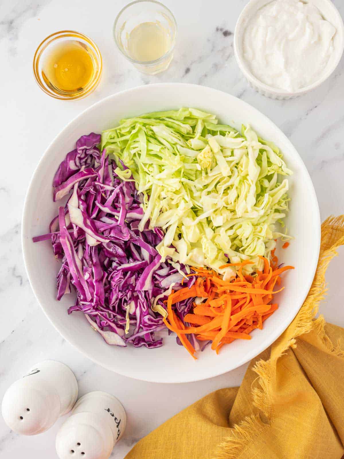 Preparing fresh coleslaw ingredients.