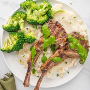 Mediterranean lamb chops with mashed potatoes and broccoli.