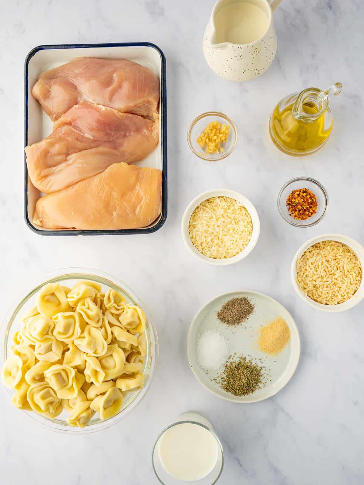 Ingredients needed for asiago tortellini alfredo with grilled chicken.