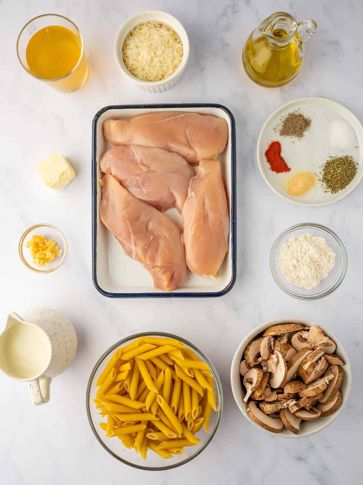 Ingredients needed for chicken parmesan garlic pasta.