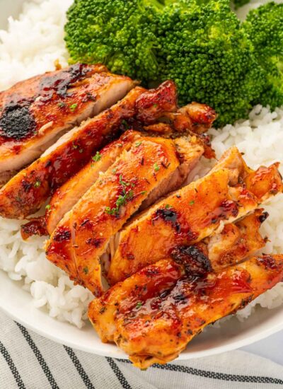 BBQ chicken thighs with rice and broccoli.