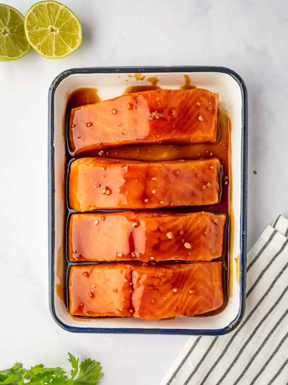 Marinating salmon filets for grilling.