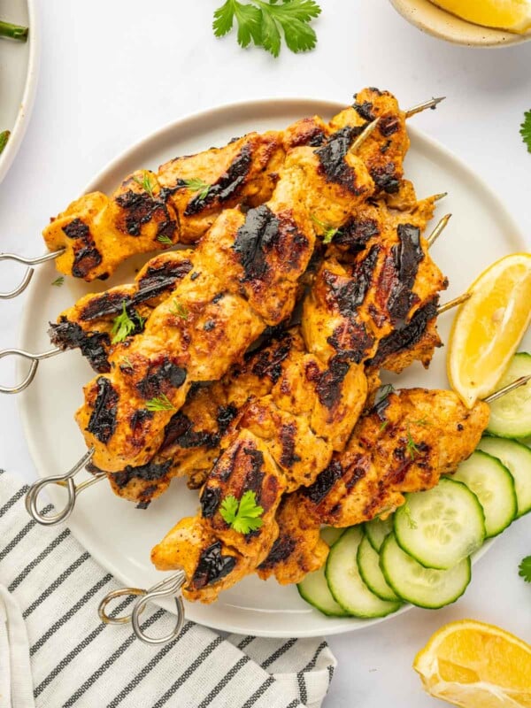 A plate of tandoori kebobs.