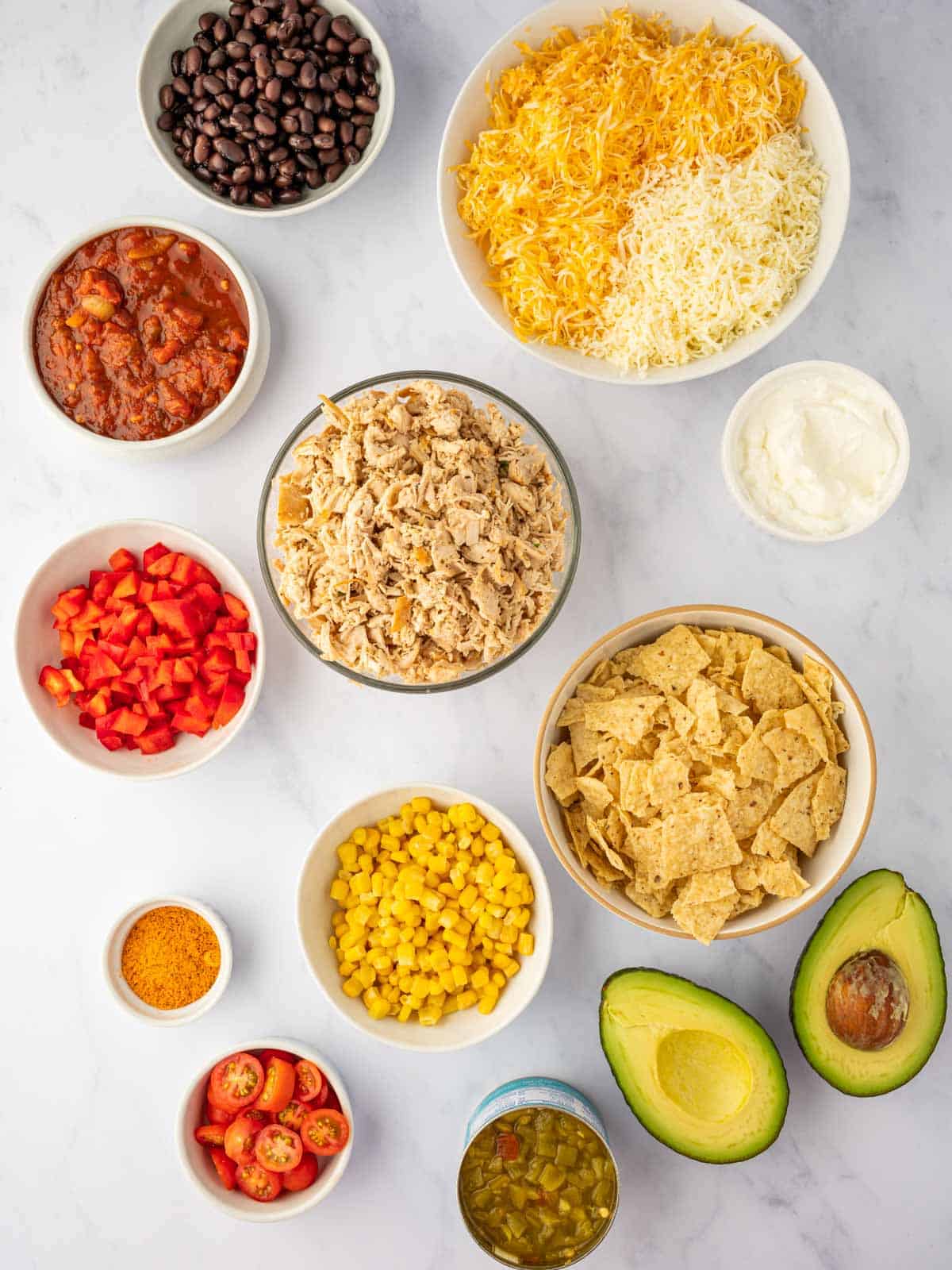 Ingredients needed to make chicken taco bake.