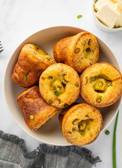 A plate full of popovers.