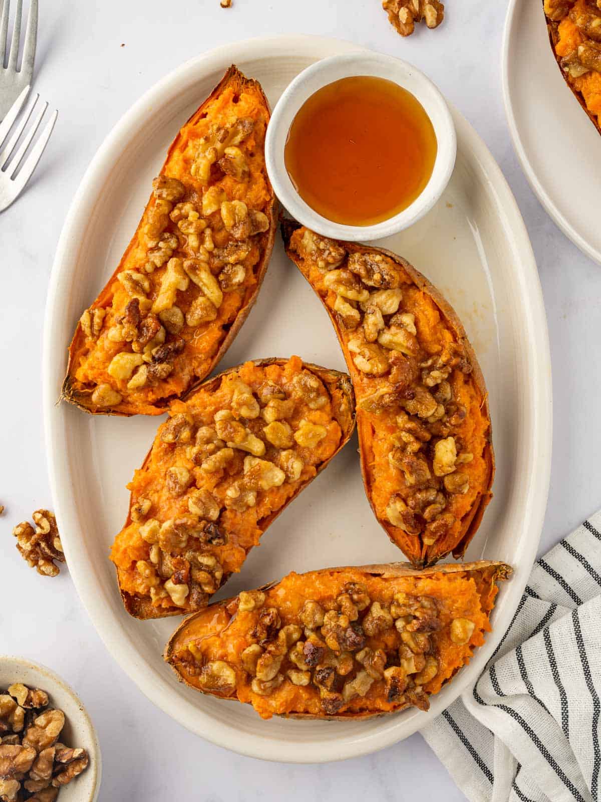 Twice baked sweet potatoes on a tray.