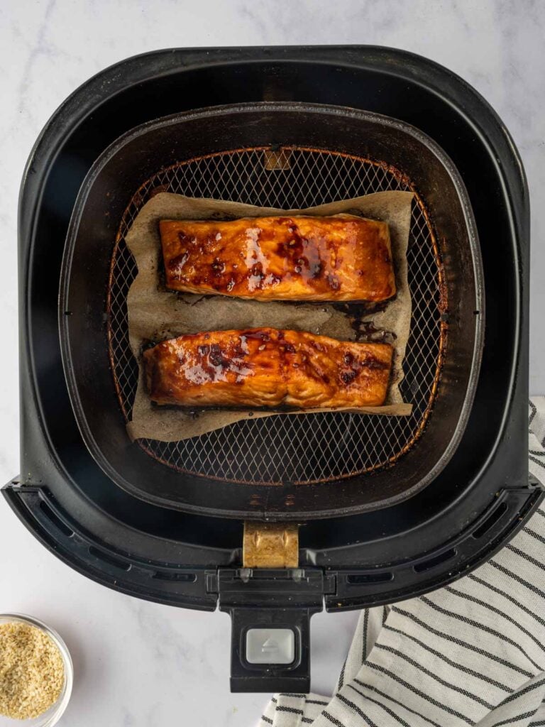 Crispy air fried salmon in an air fryer.