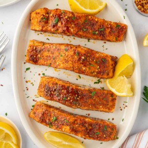 Easy baked salmon recipe on a platter.