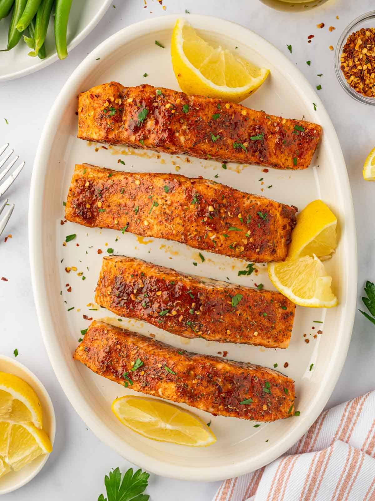 Easy baked salmon recipe on a platter.