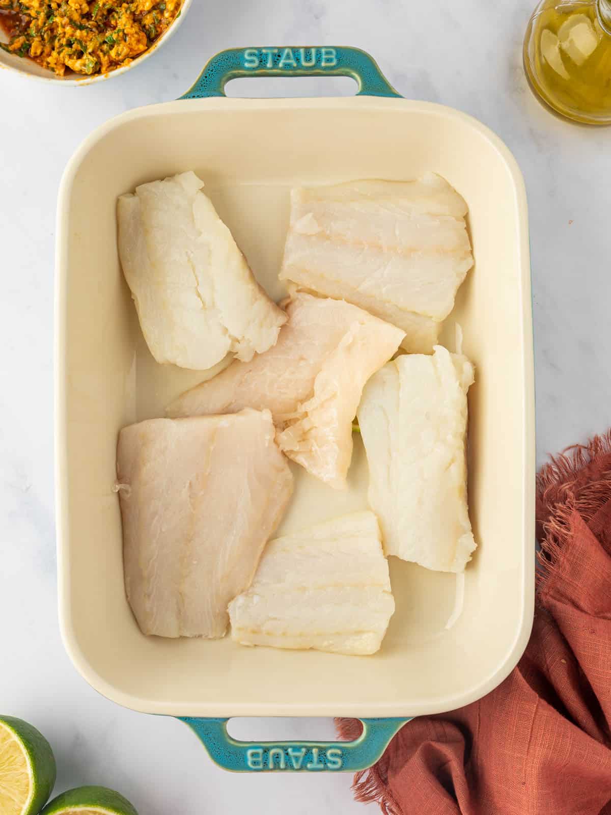 Dry cod filets in a dish.