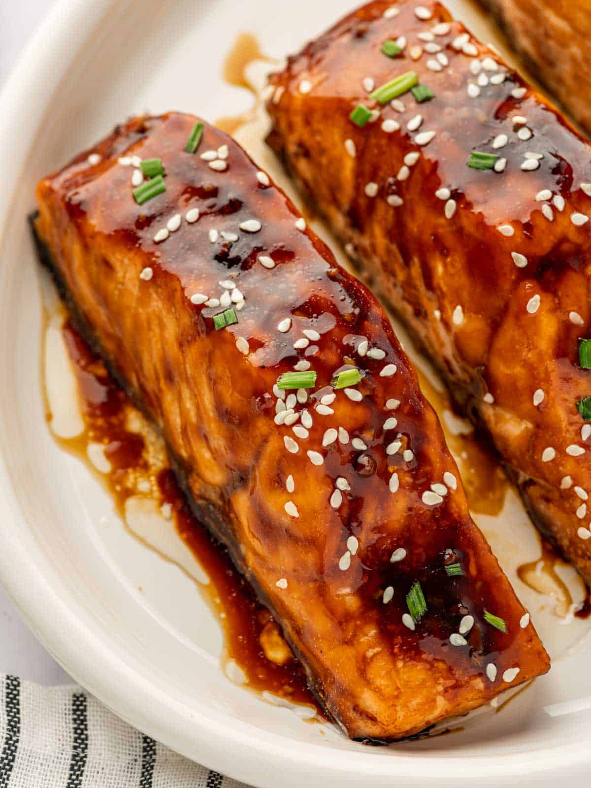 Close up of salmon with teriyaki glaze.