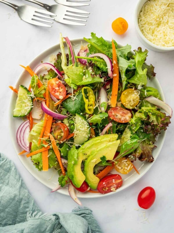 A serving of house salad on a plate.