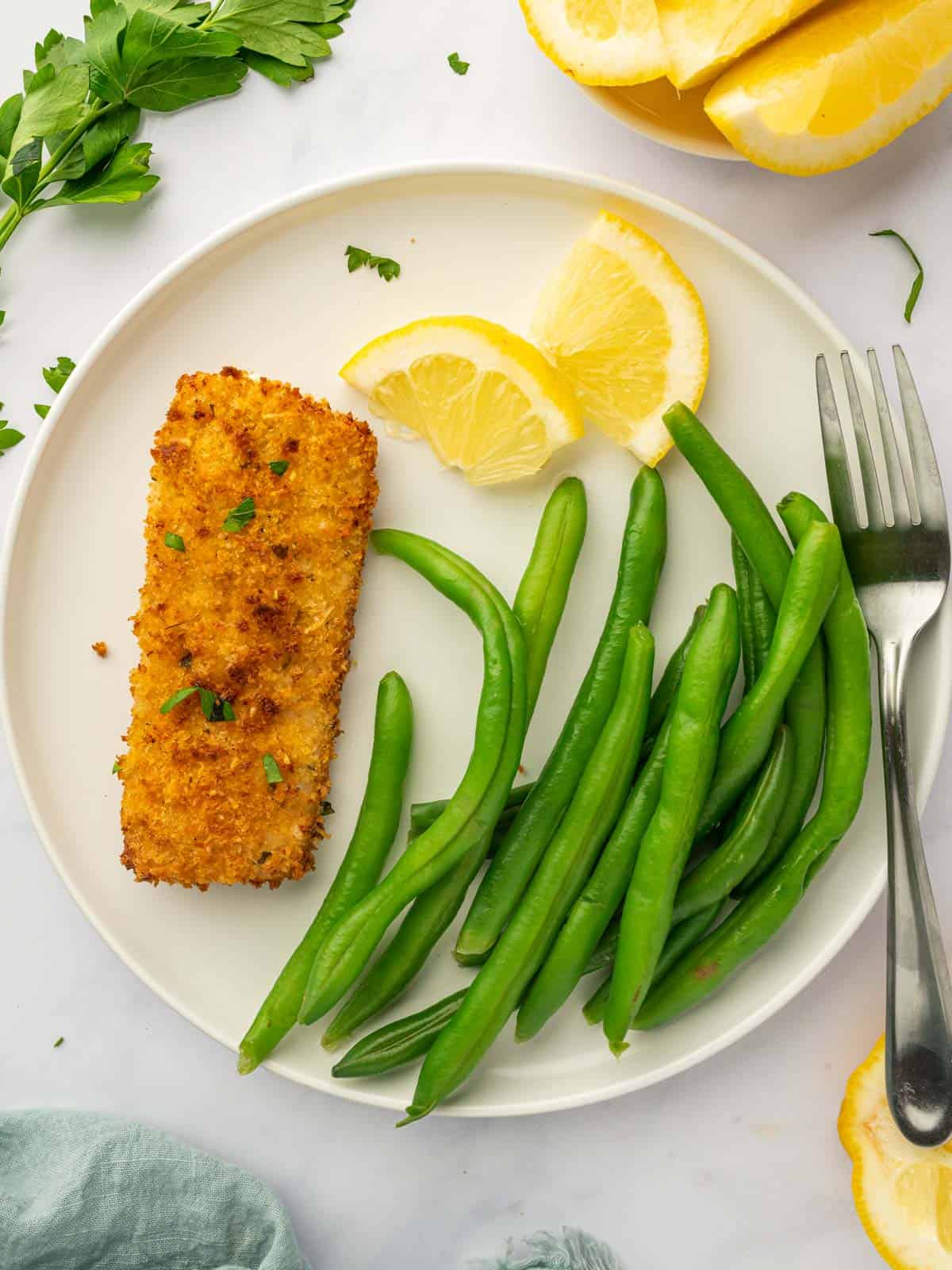air fried mahi mahi fillet served with string beans.