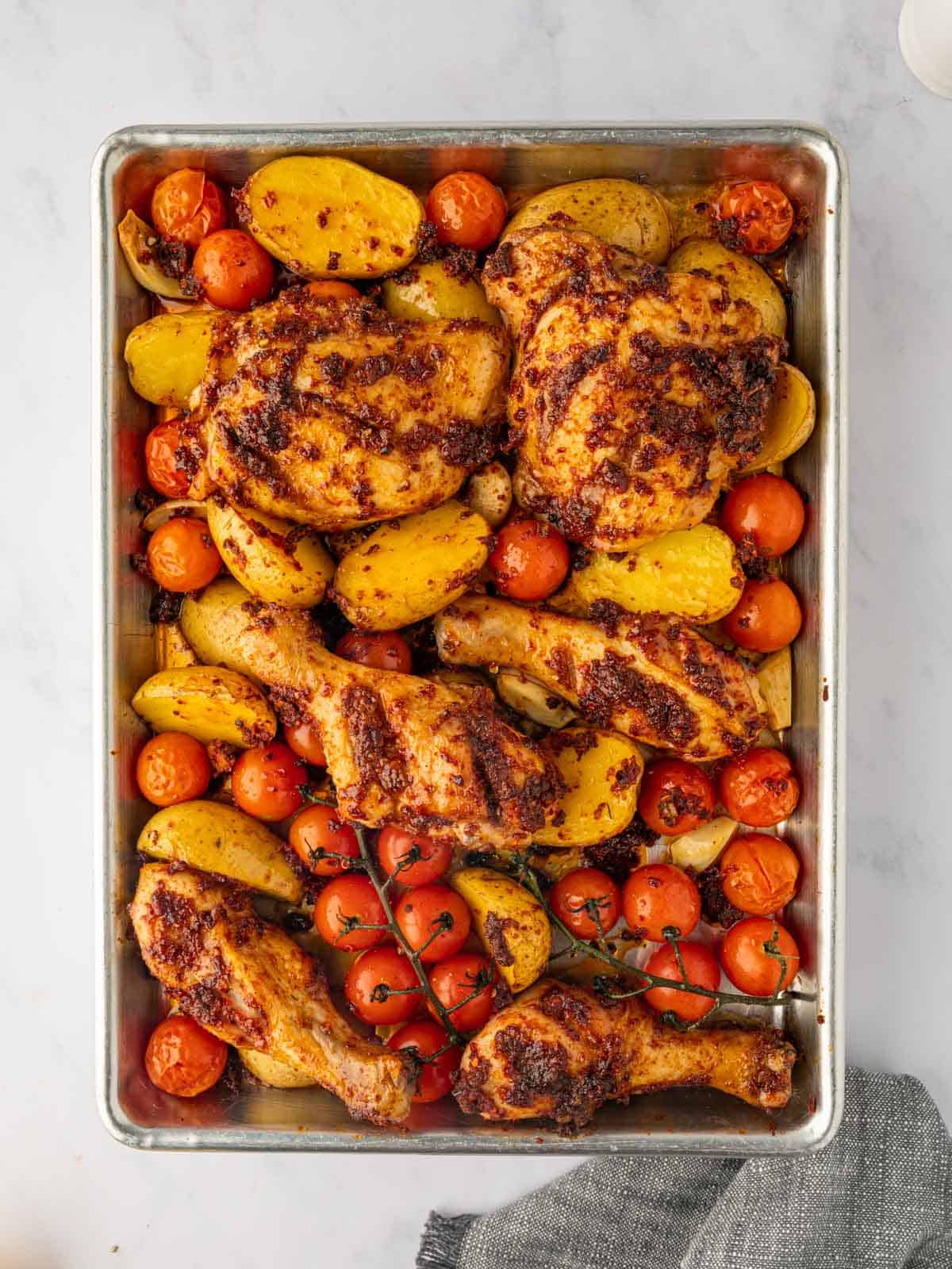 Chicken harissa on a tray.