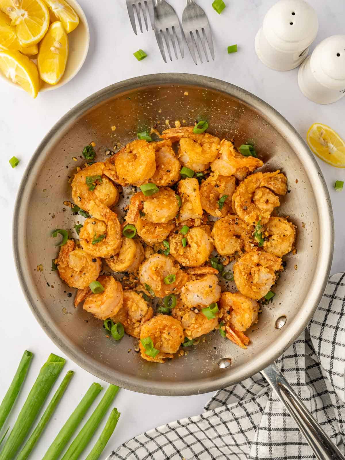 Salt and Pepper Shrimp in a skillet.