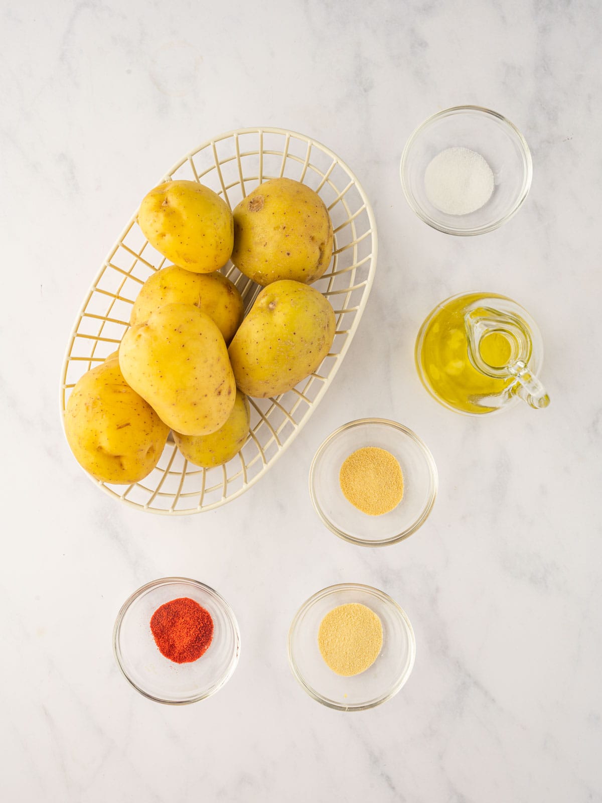 Ingredients needed for crispy air fryer sliced potatoes.