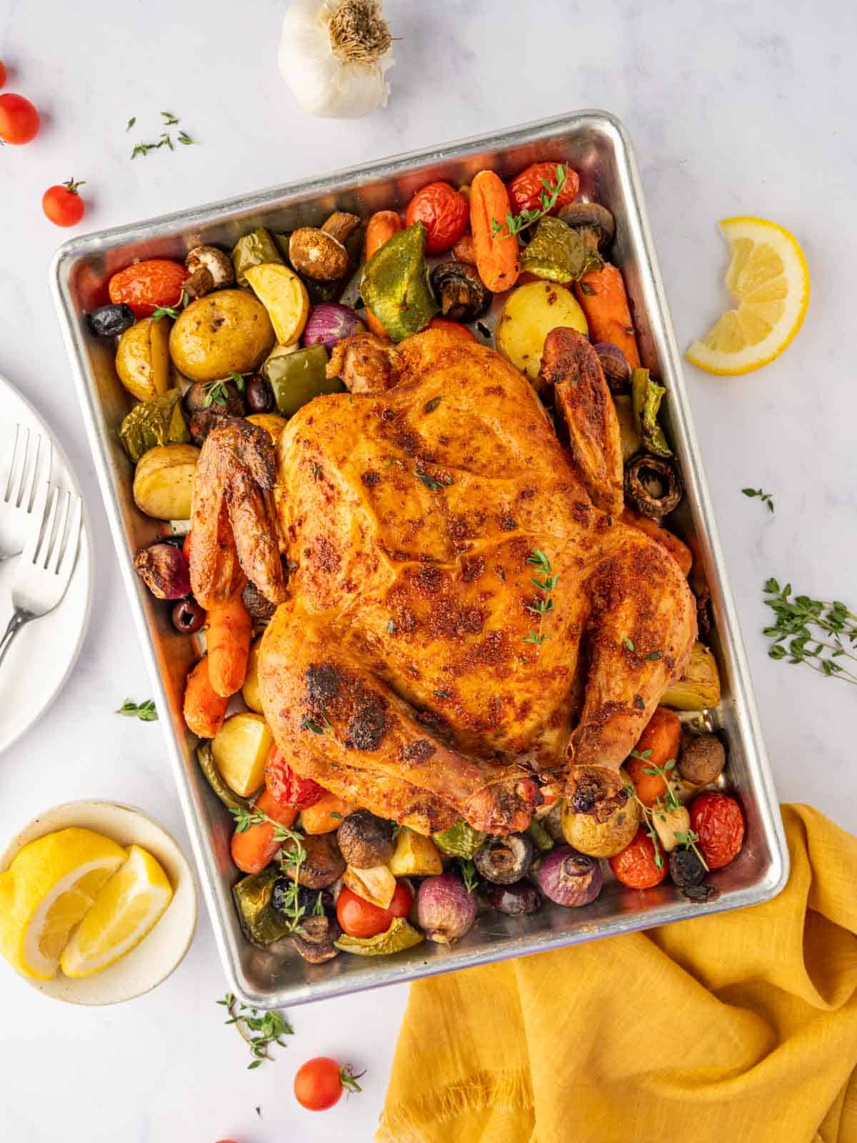 A whole roasted chicken traybake.