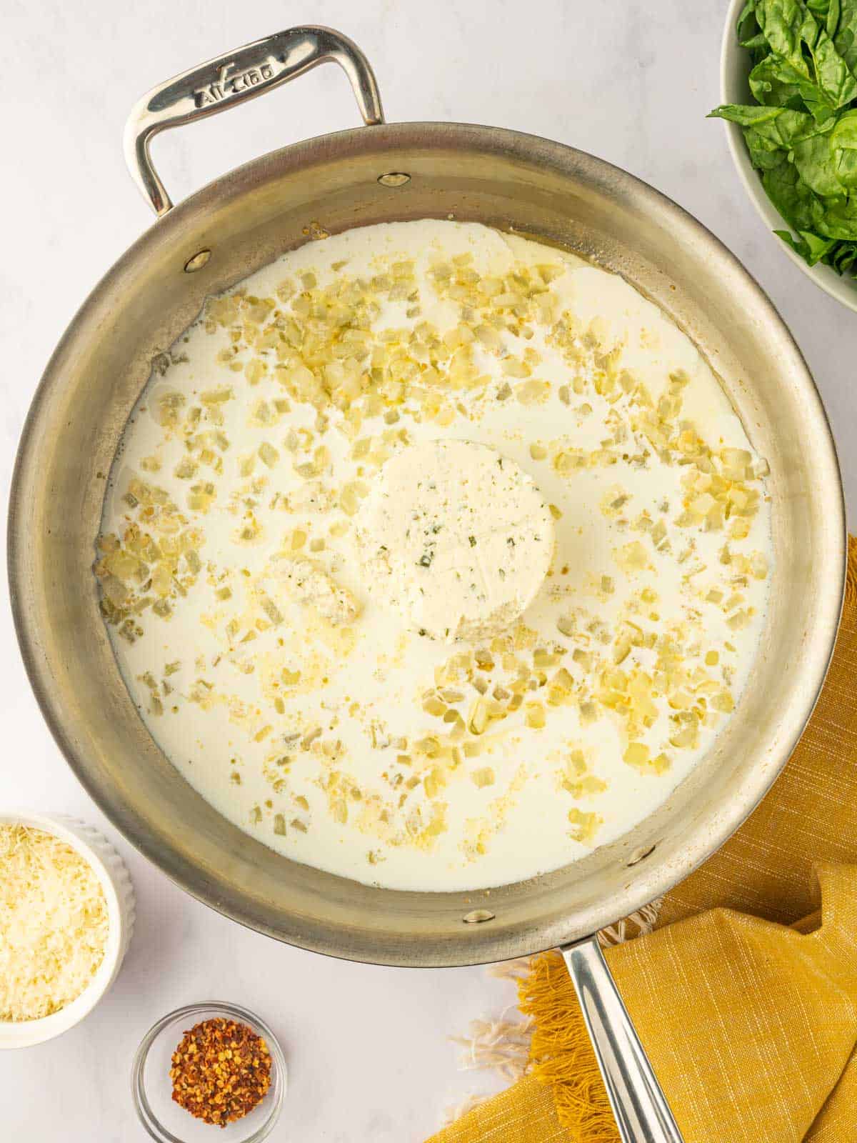 Gently melt the boursin cheese.