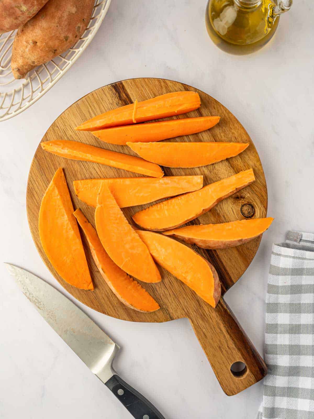 How to slice sweet potatoes into wedges.
