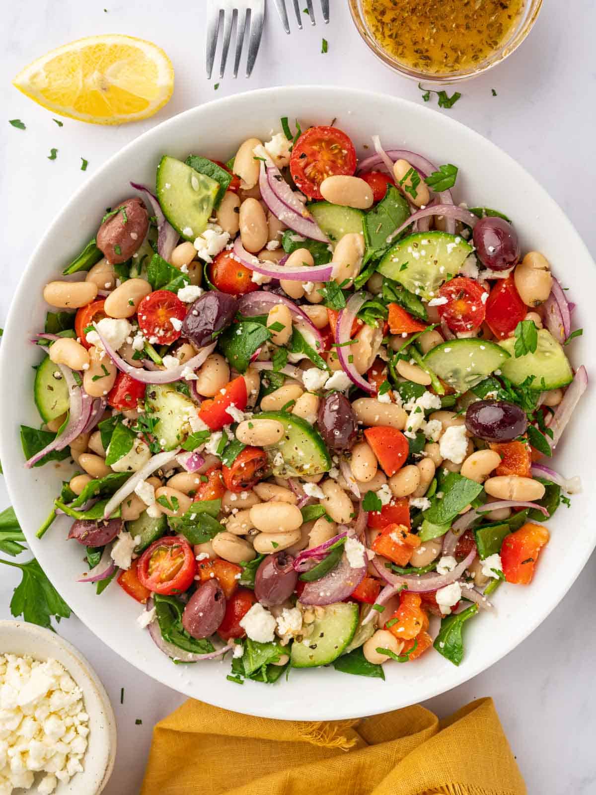 Fresh Greek White Bean Salad serving in a bowl.