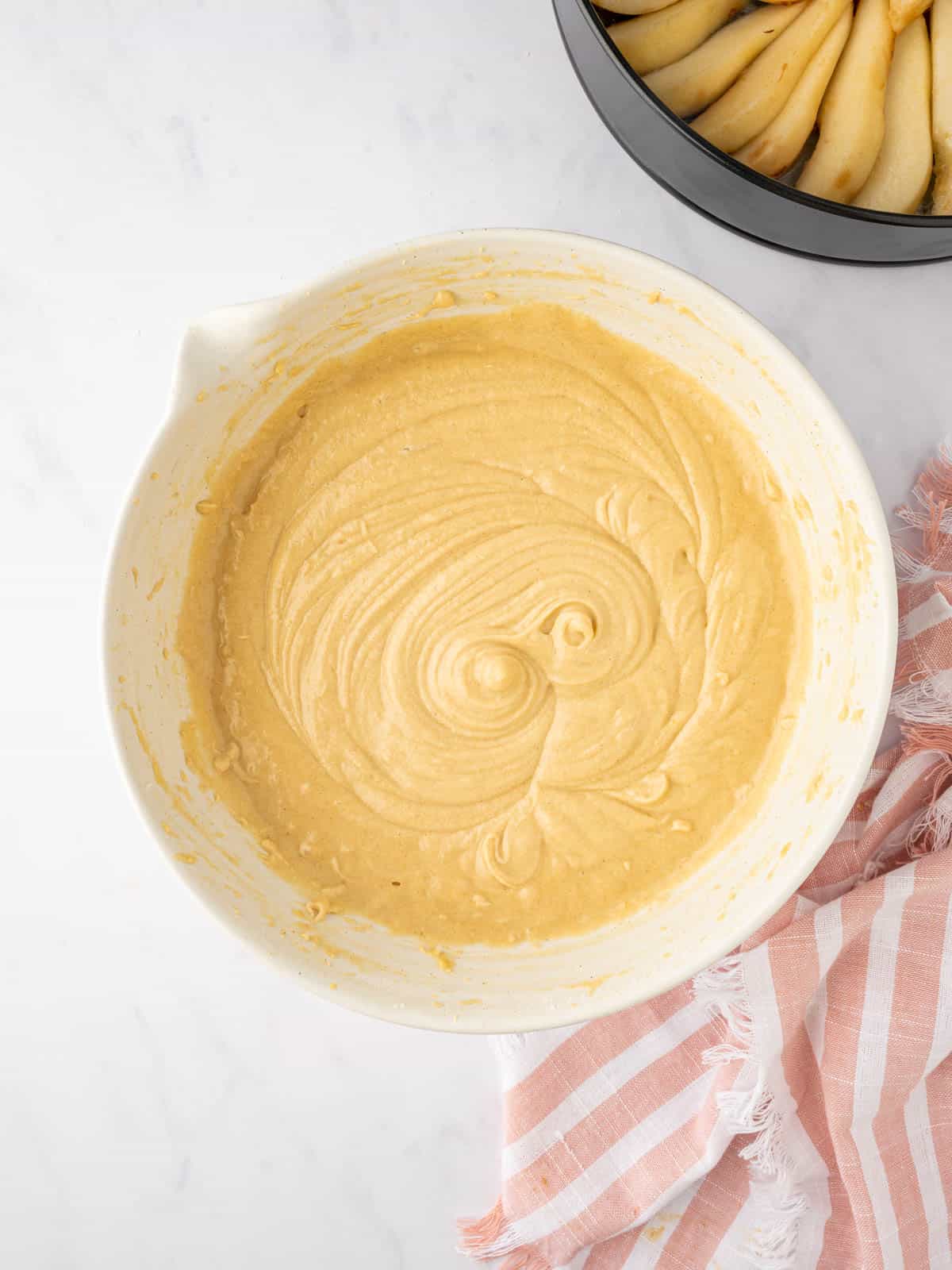 Prepared cake batter in a bowl.