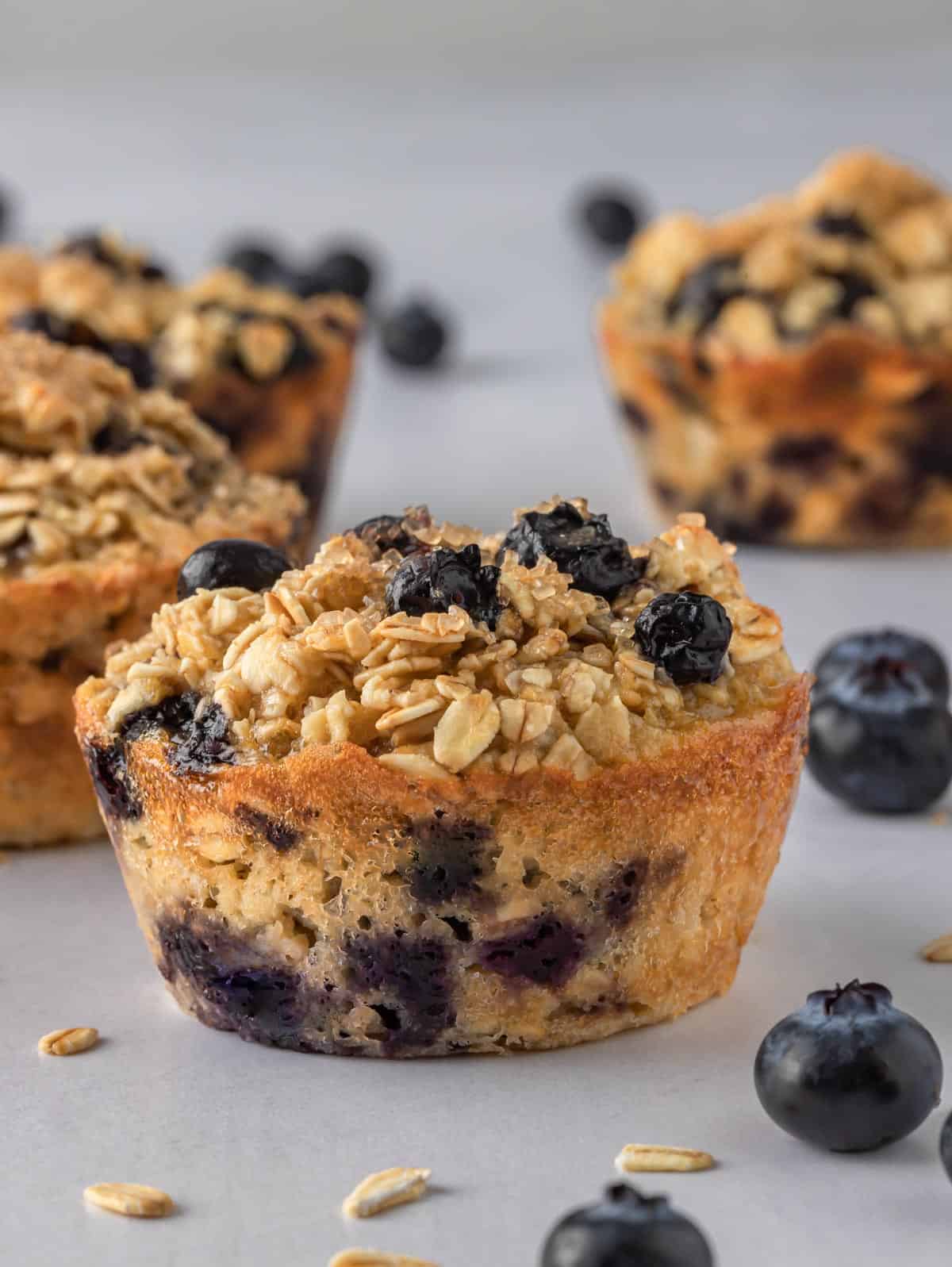 A closeup photo of a blueberry oatmeal cup.
