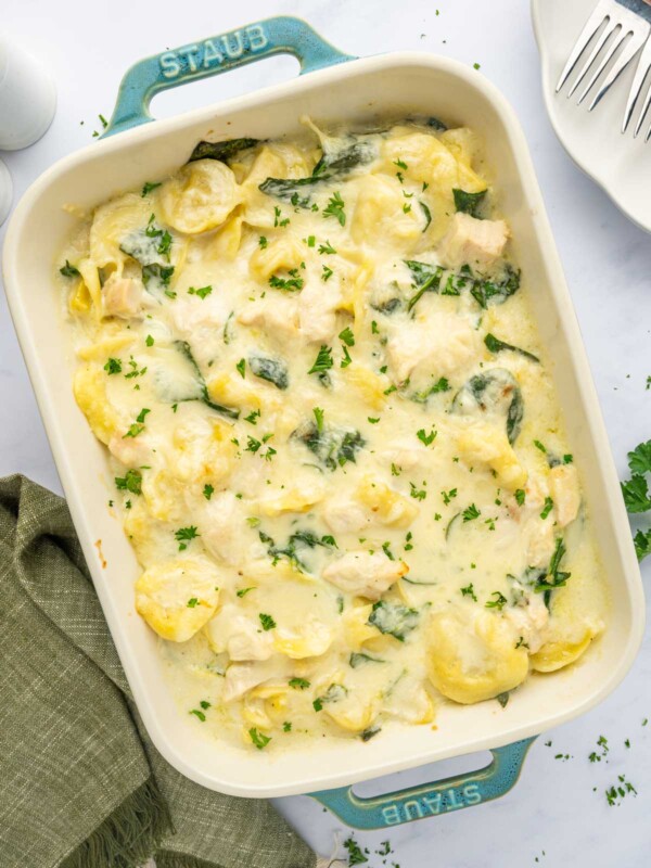 Creamy tortellini bake in a casserole dish.