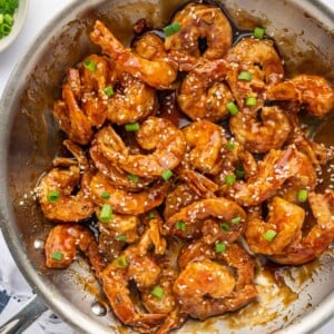 Honey shrimp in a skillet.