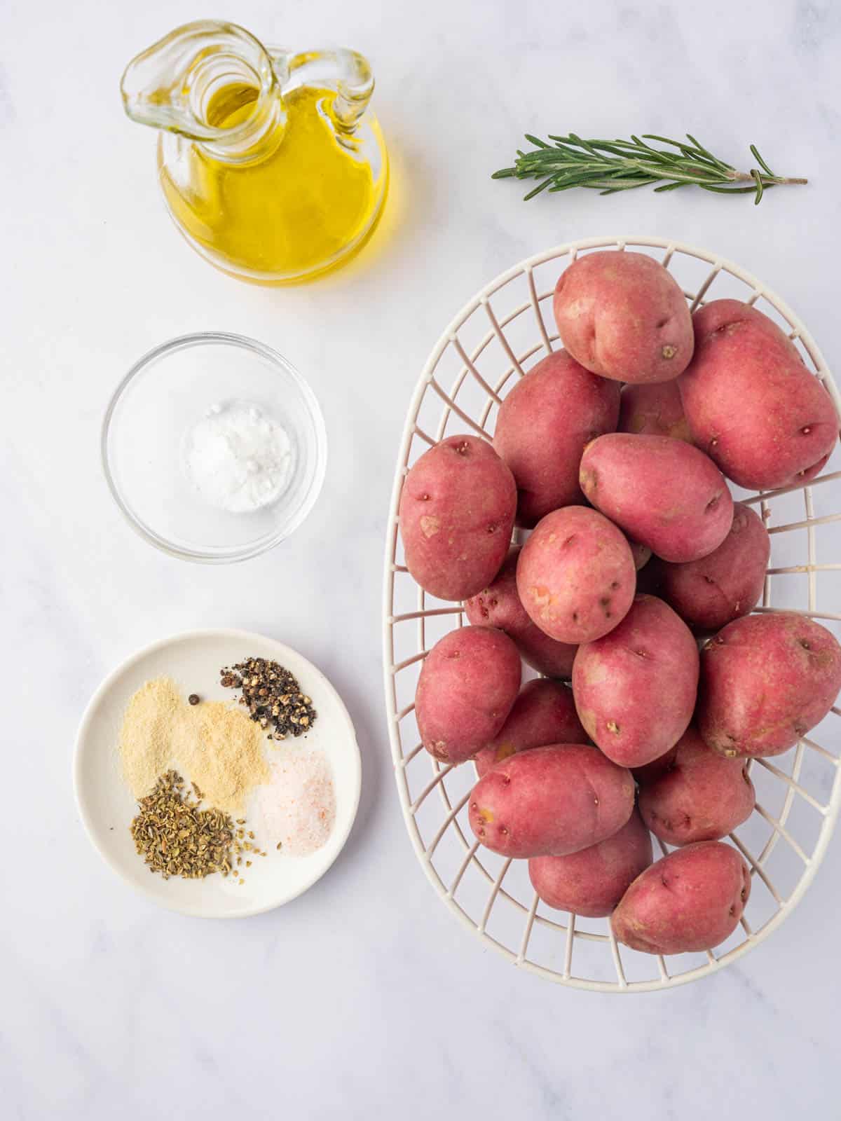 Ingredients needed to make roasted baby potatoes.