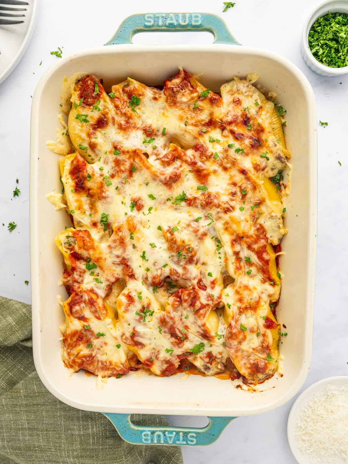 A pan of stuffed pasta shells filled with beef and cheese.