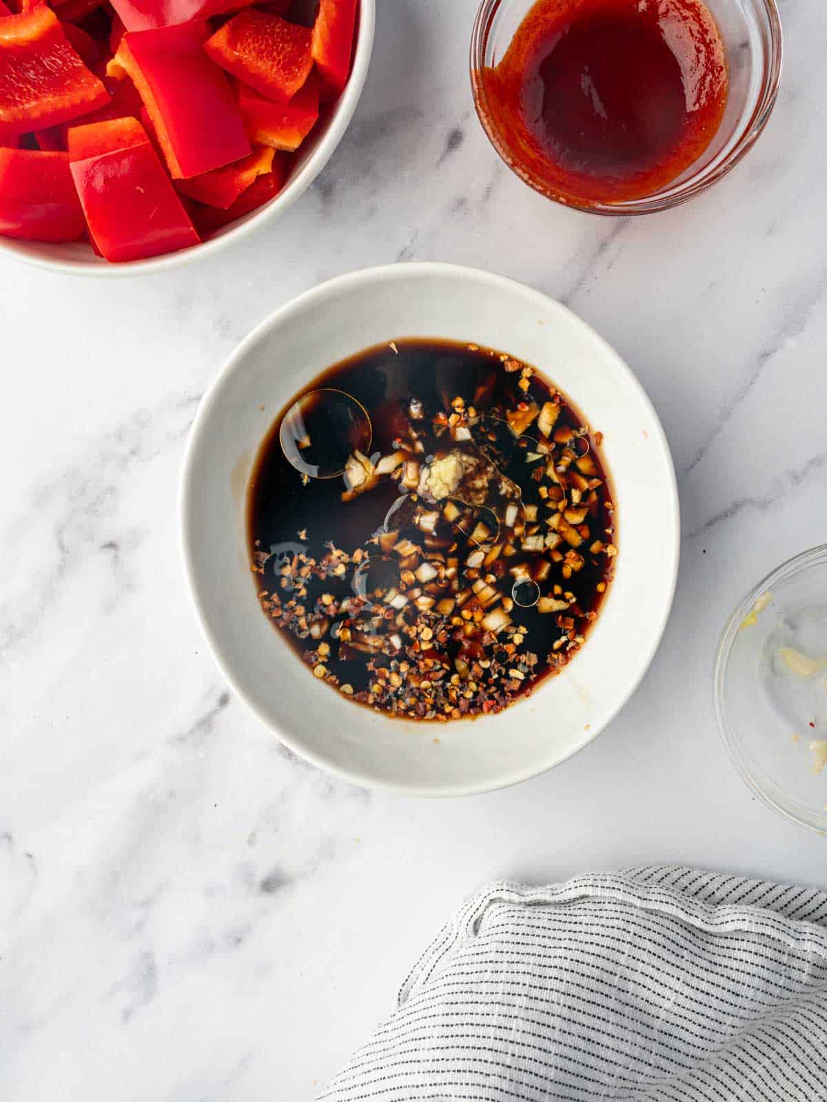 Sizzling shrimp sauce in a small bowl.