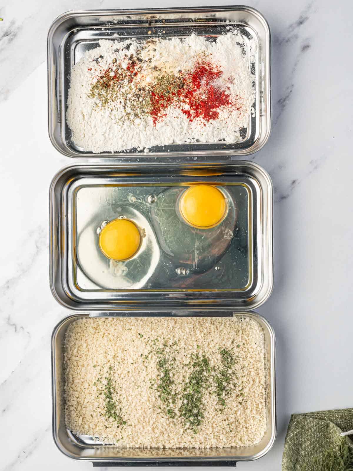 Breading stations for crispy baked cod.