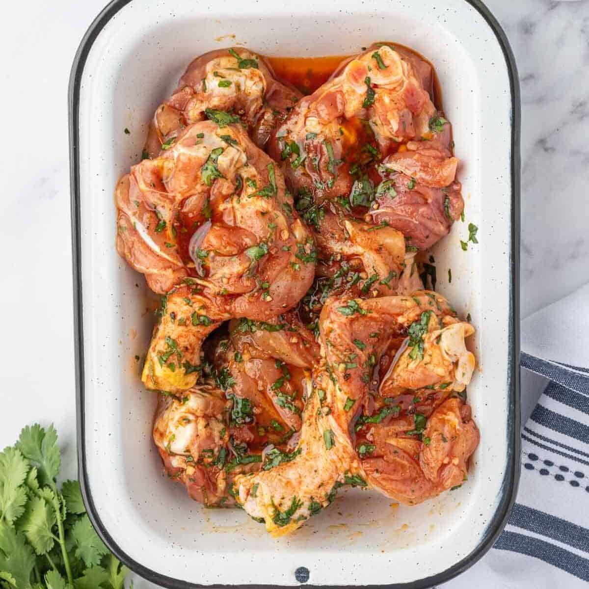 Chicken marinating in cilantro lime sauce before air frying.
