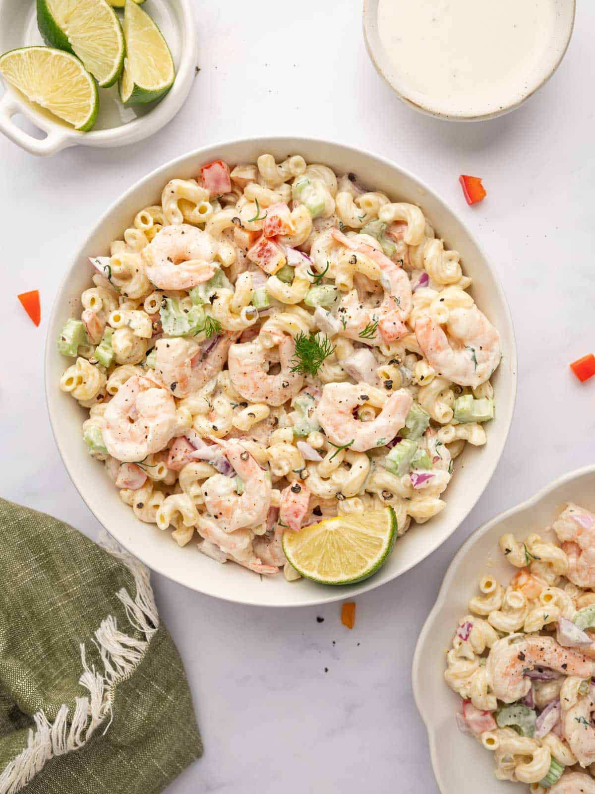 A bowl of macaroni shrimp salad.