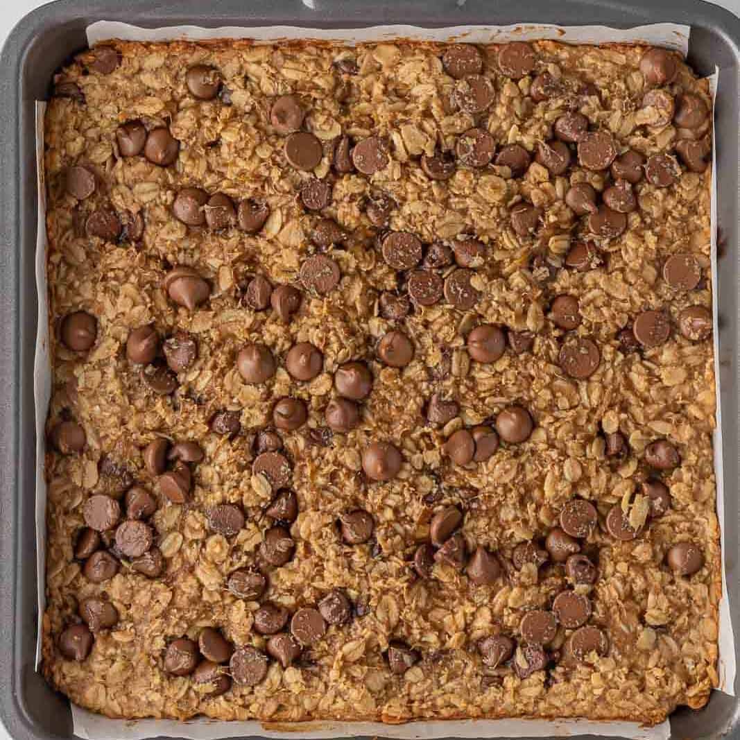 Baked oatmeal bars in a pan.