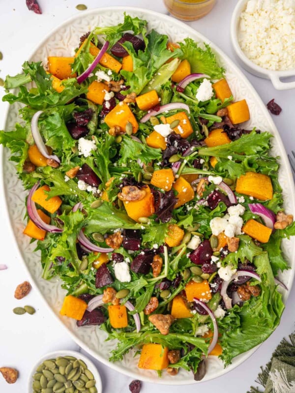 Butternut squash feta salad on a large platter for serving.