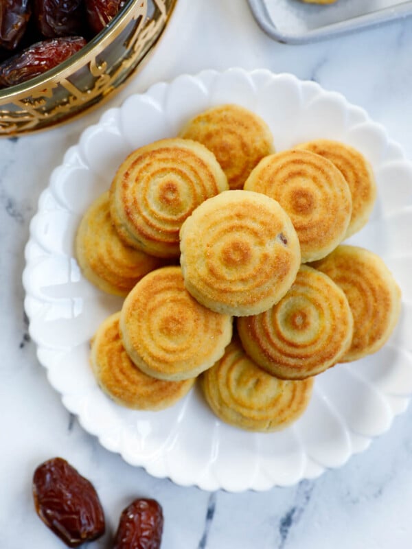 Date filled maamoul on a white plate.