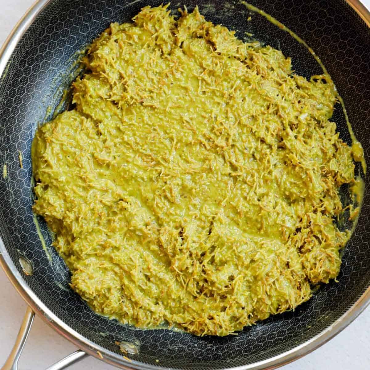 Pistachio cream kunafa filling in a skillet.