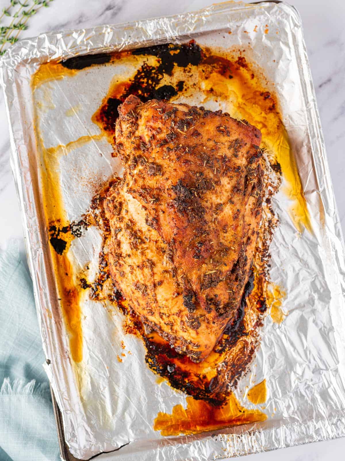 Boneless roasted turkey breast after baking.