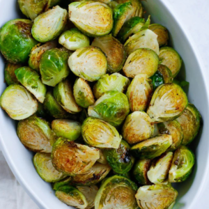 Roasted Brussels sprouts with golden cut sides and seasoned surfaces.