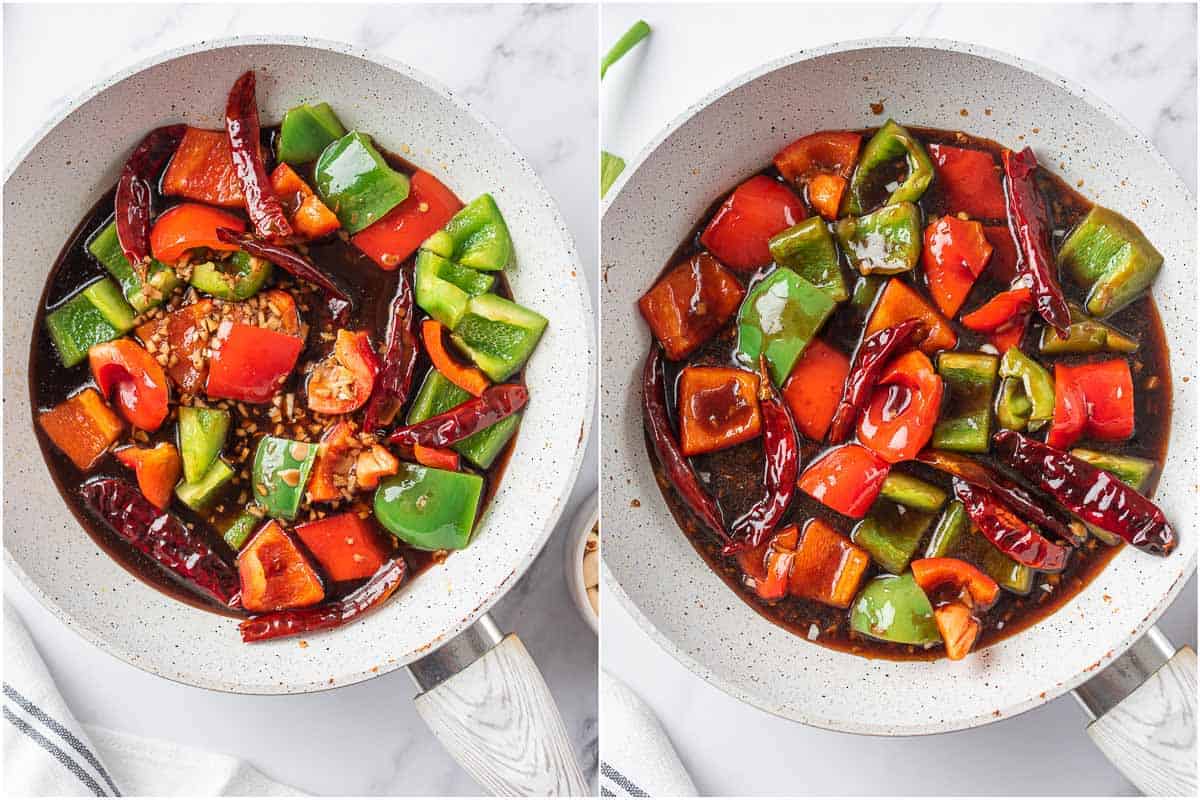 Bell peppers and dried red chilies with sauce in a skillet.