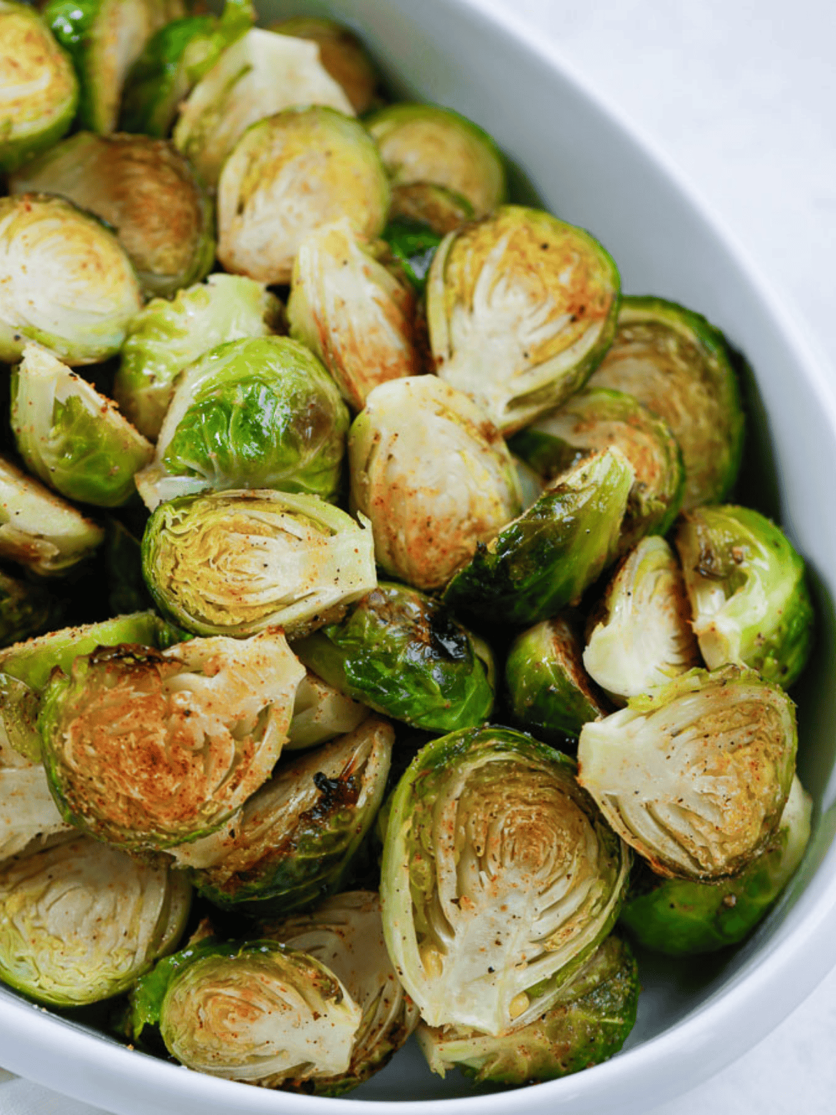Roasted Brussels sprouts with golden cut sides and seasoned surfaces.