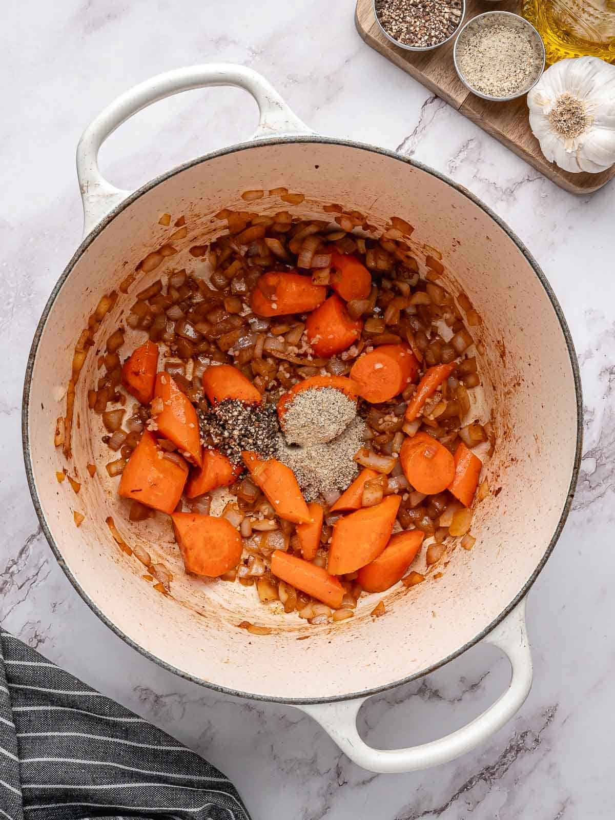 Seasonings added to carrots and onions.
