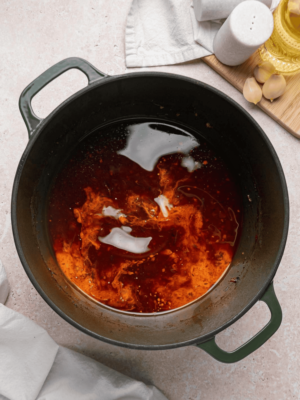 Braising liquid remaining in the Dutch oven for making the gravy.