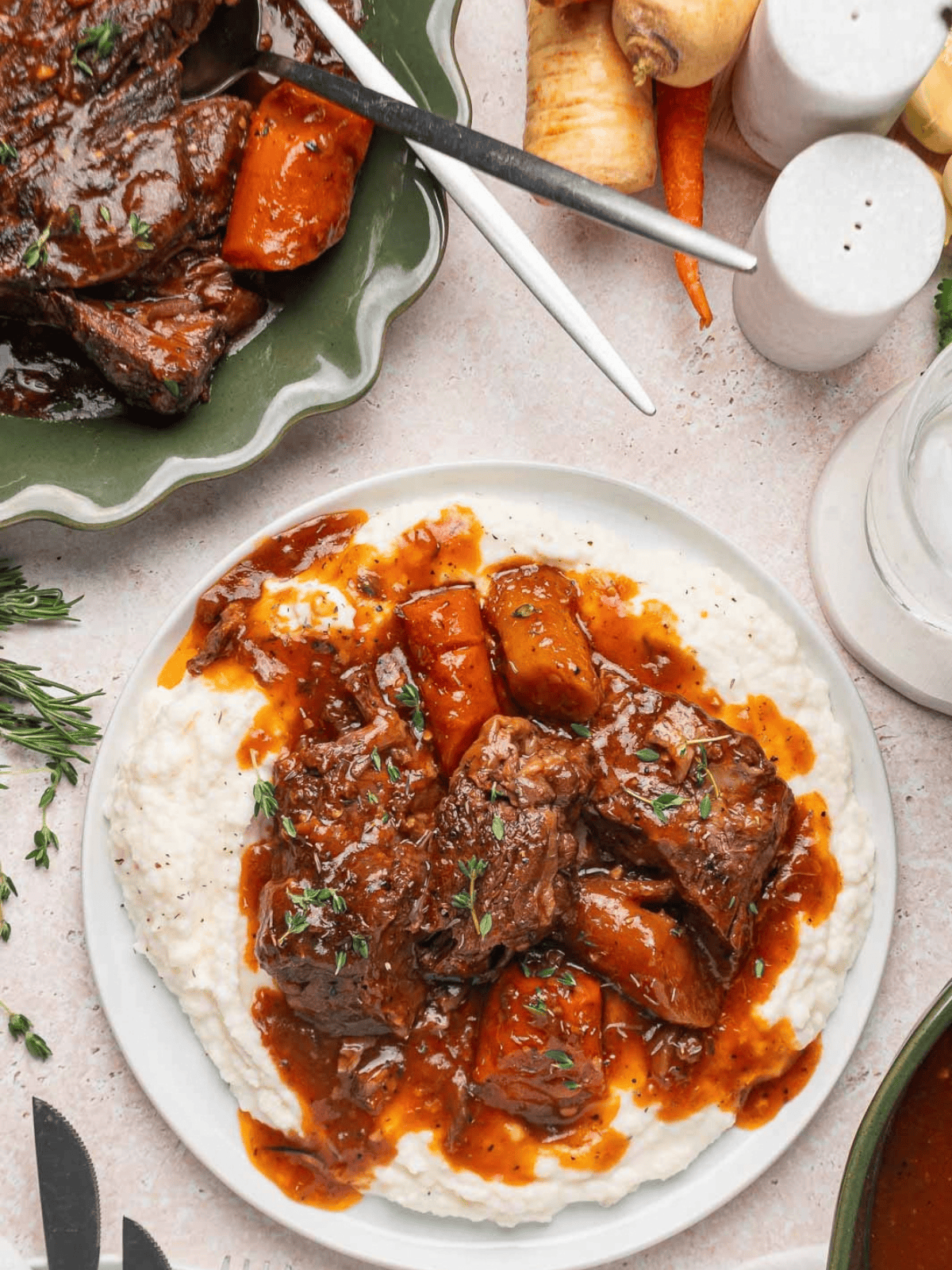 Chuck roast, carrots, parsnips, and gravy served over mashed potatoes.