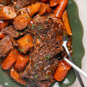 Chuck roast with glazed carrots and parsnips in homemade gravy.
